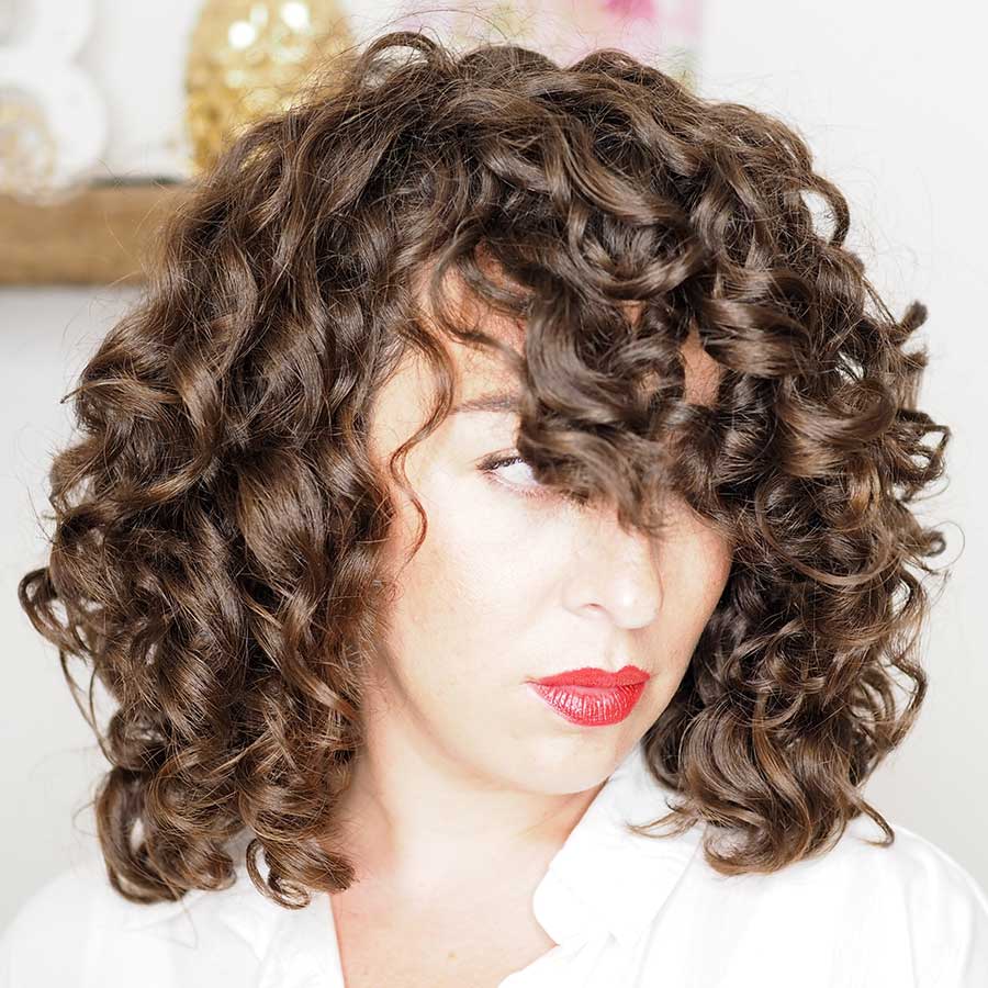 Image of Blunt cut with waterfall curls curly hair