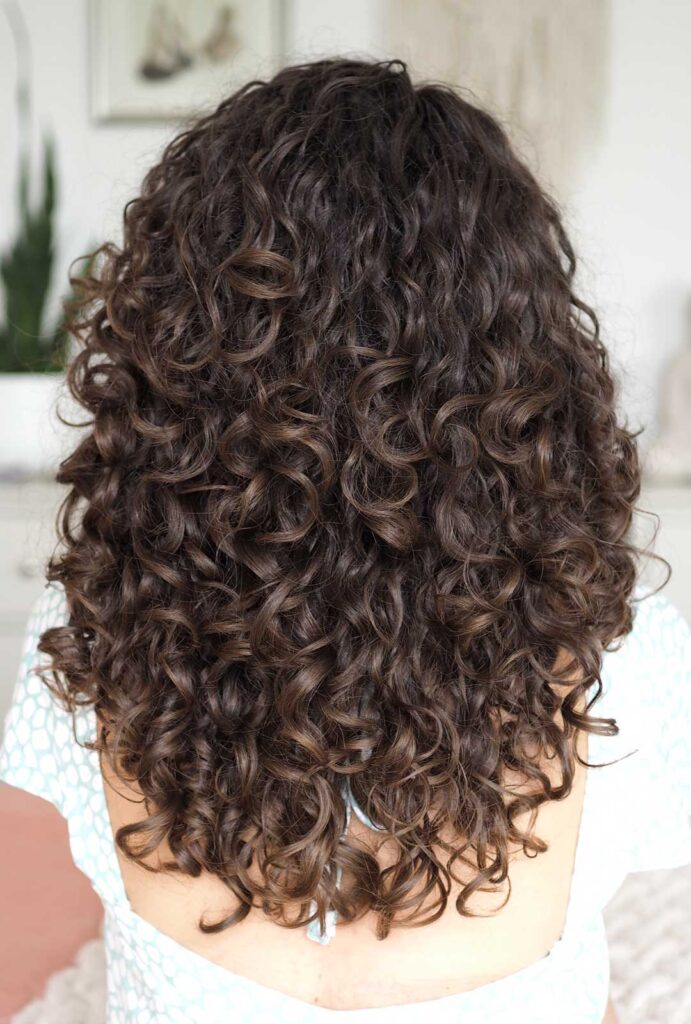 Dark curly deals hair